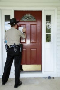 Officer Posting an Eviction